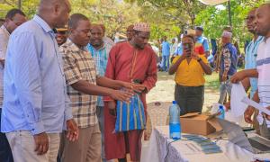 Walk through a Passport registration tent during the commemoration of Pemba's one year of citizenship