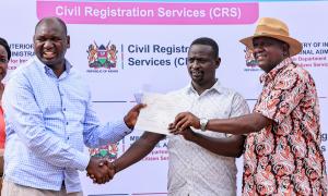 Parent receives child's birth certficate